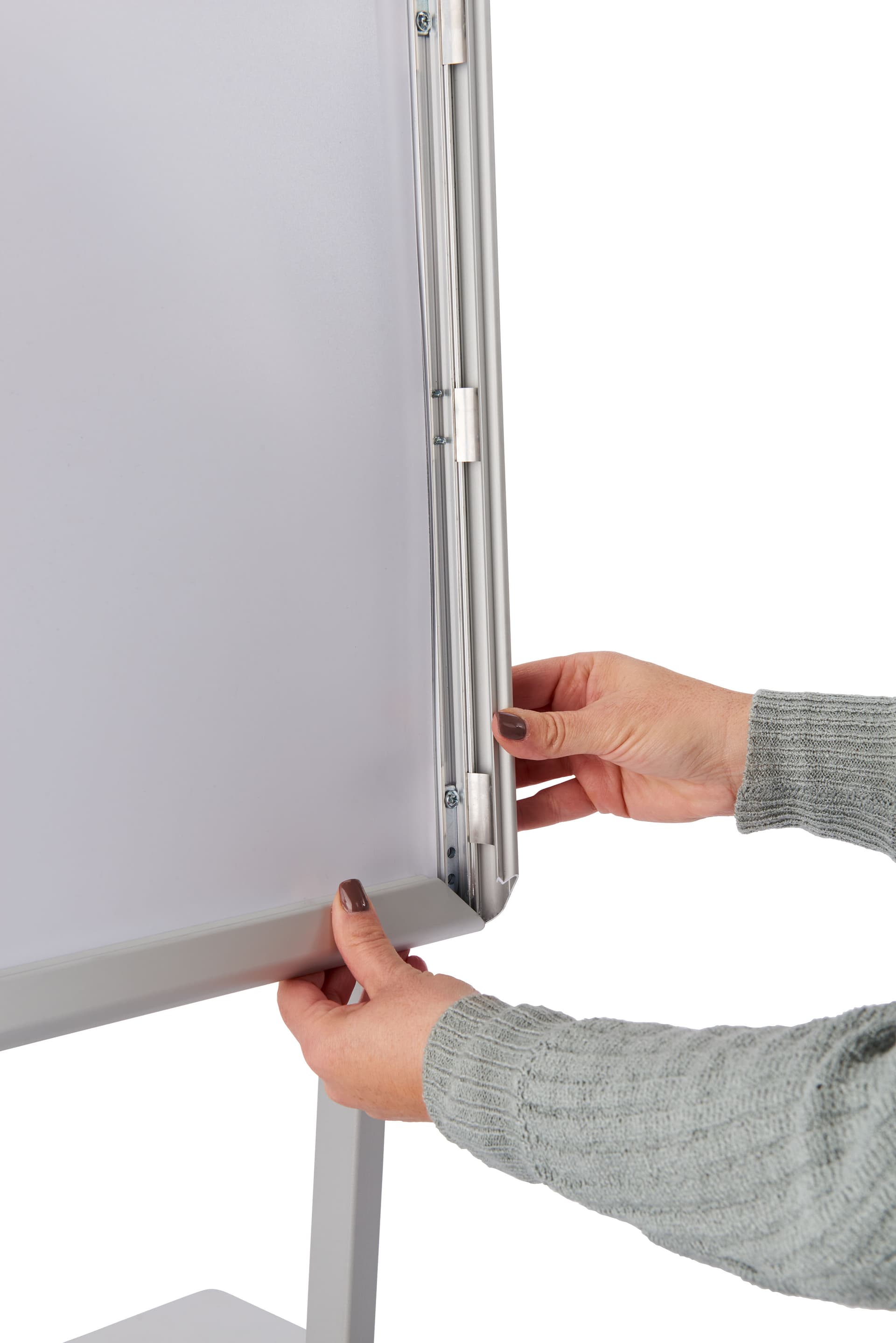 Silver countertop frame snaps open for quick graphic changes