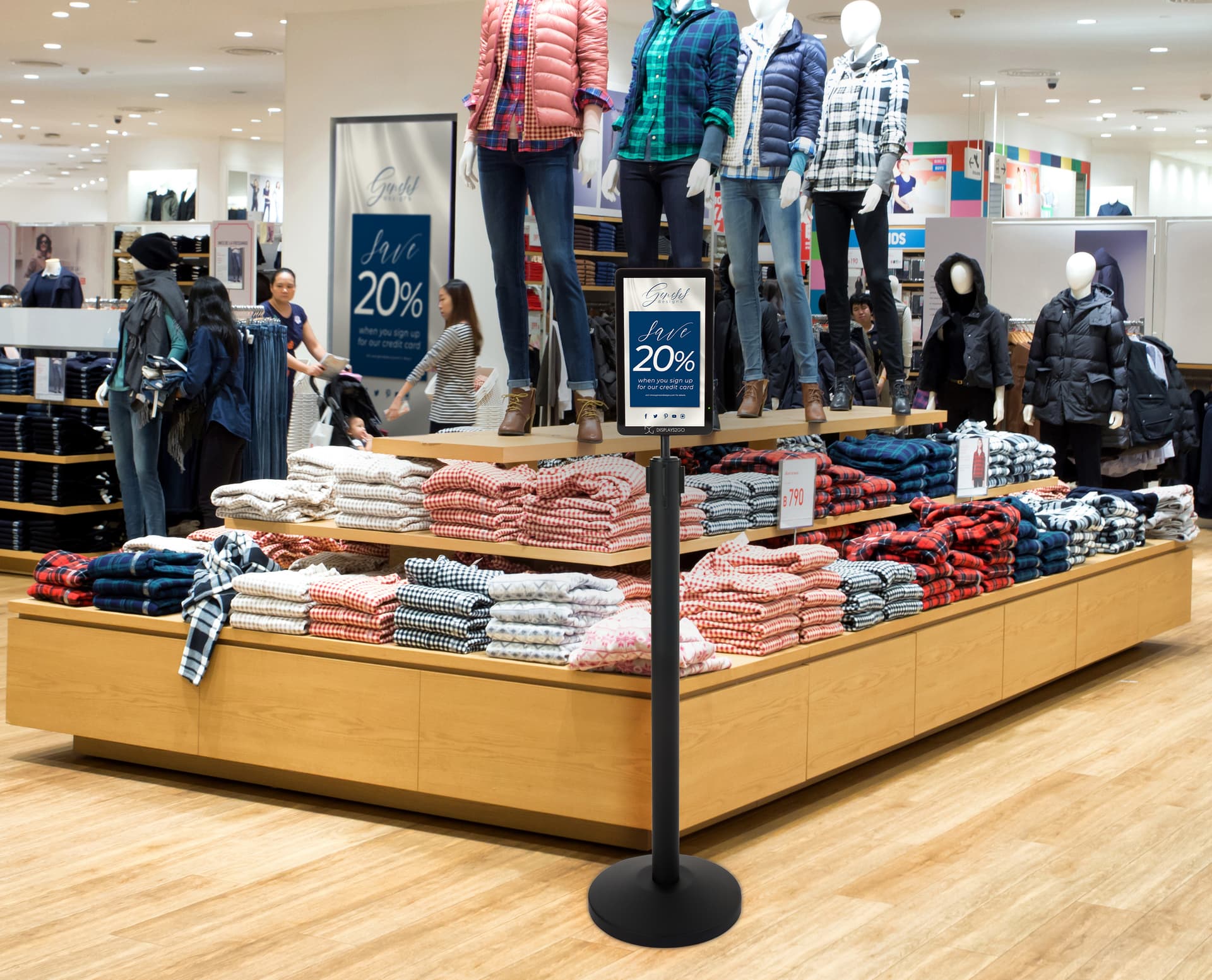 Floor standing digital sign stanchion helps advertise promotions 