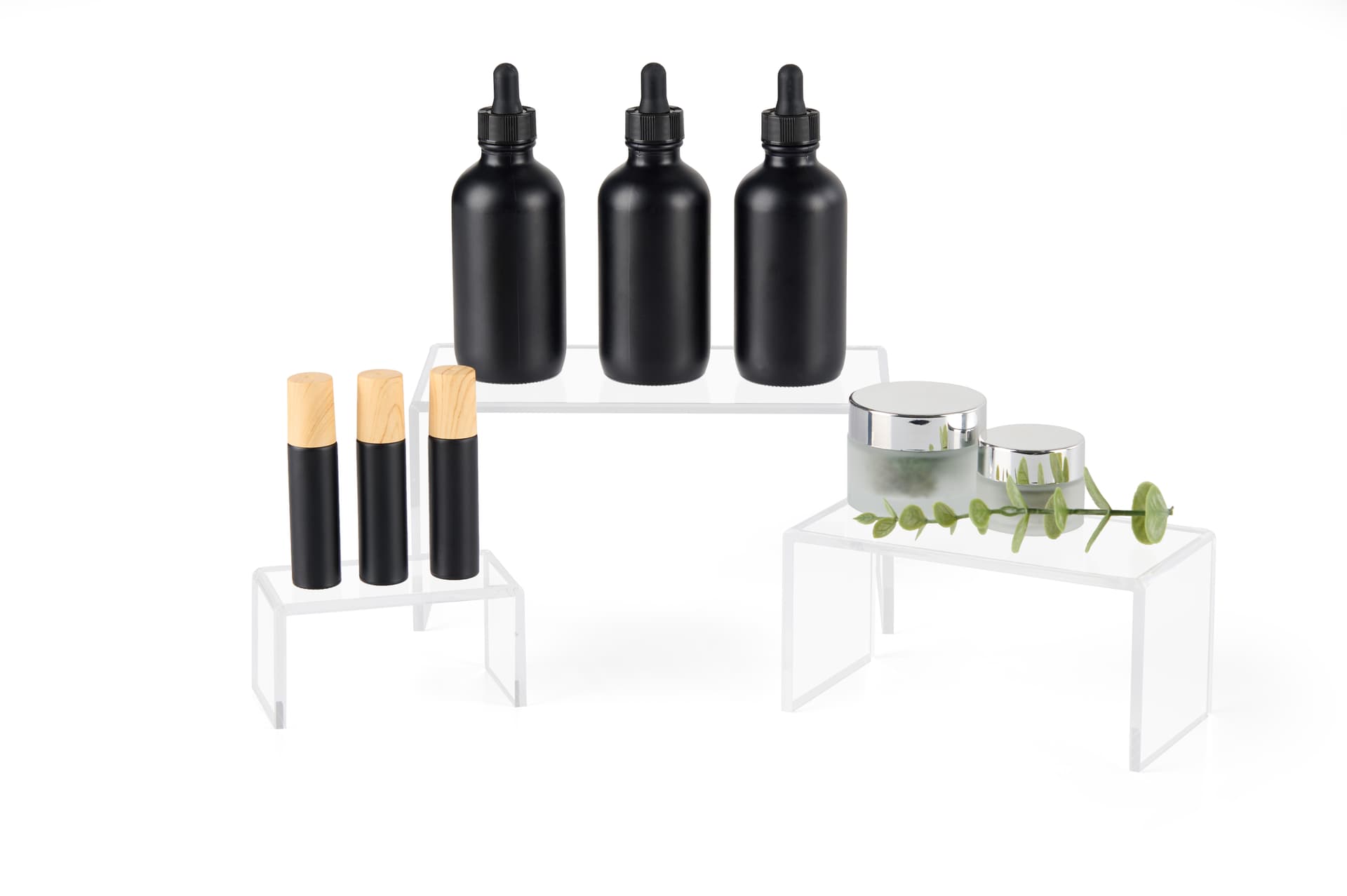 Stackable retail riser in three sizes