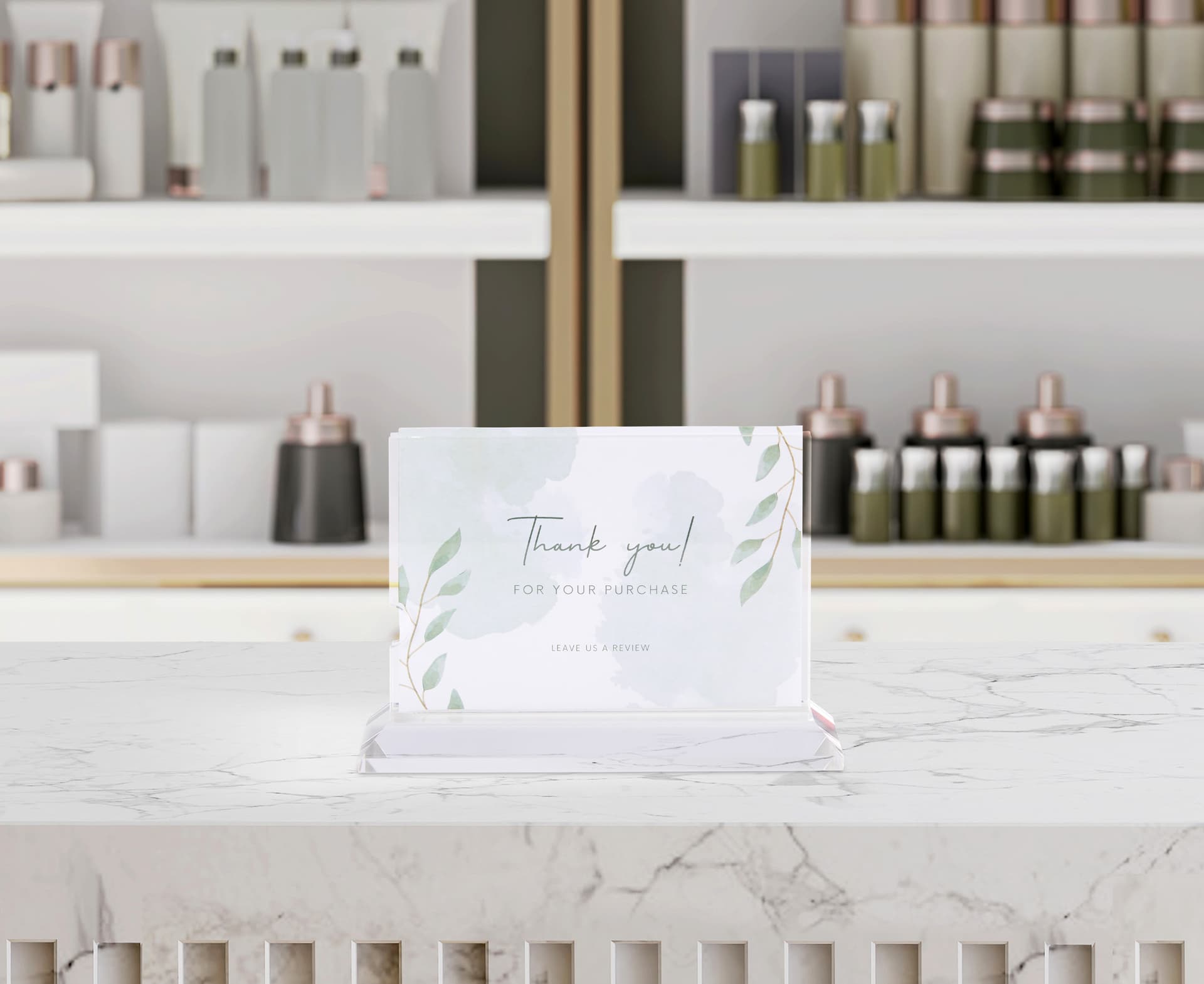 Horizontal acrylic sign holder placed on countertop in retail setting