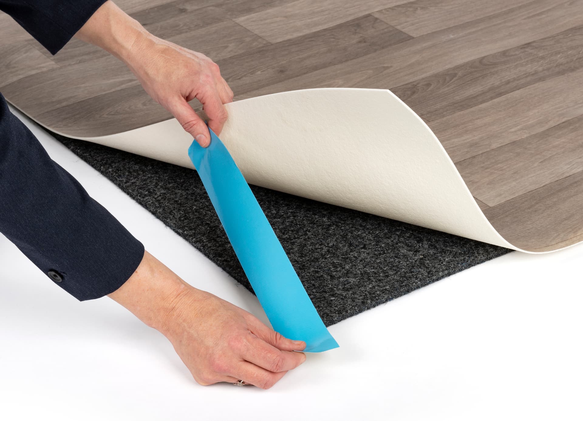 Simple installation of portable rollable vinyl event flooring