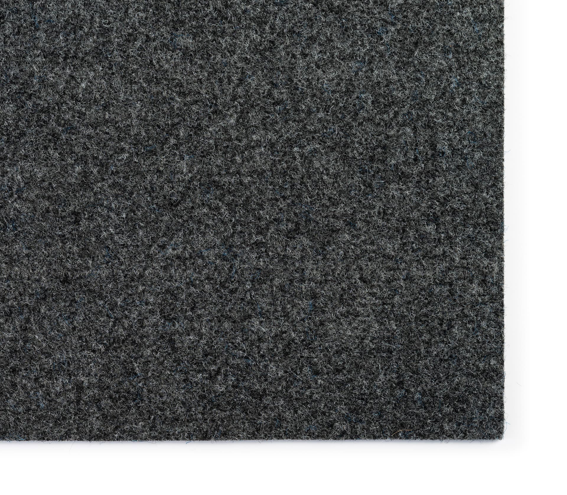 Portable rollable vinyl event flooring with two rolls of grey padding