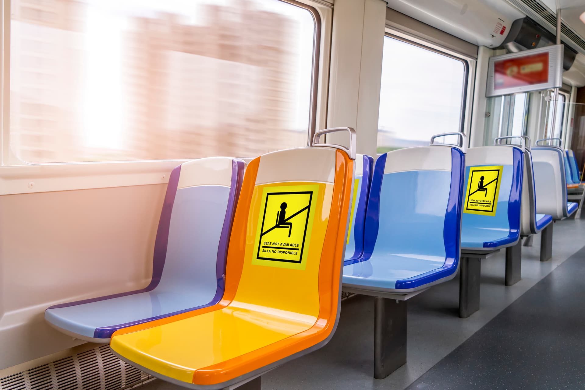 English/Spanish social distancing seat sticker with pre-printed graphic