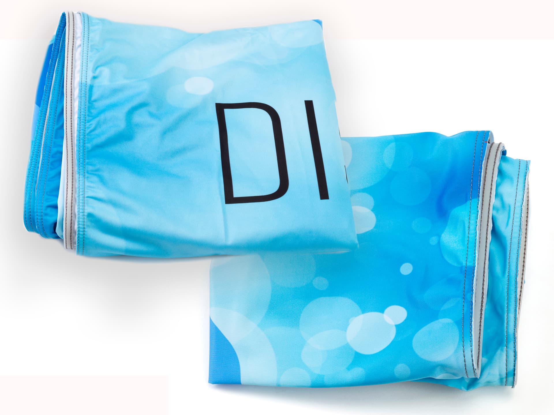 Dye sublimation printed stretch polyester with 2-sided 8x10 silicone edge backdrop