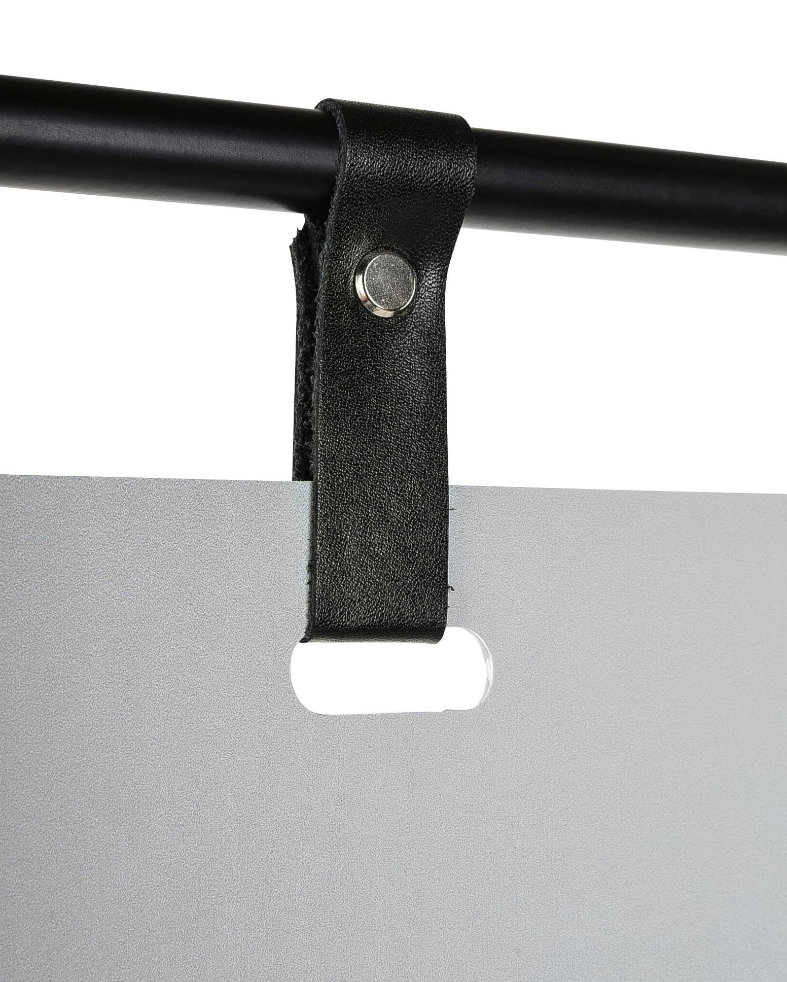Minimalist sign stand with modern black leather straps