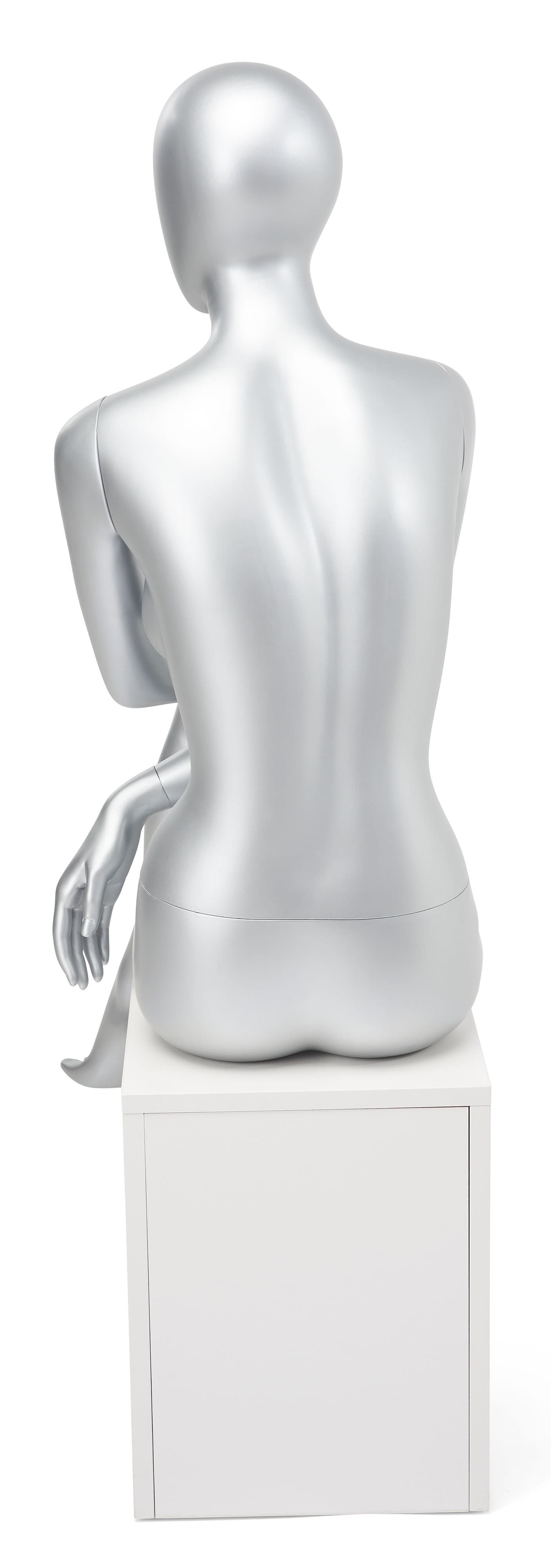 Abstract seated female mannequin with modern design 