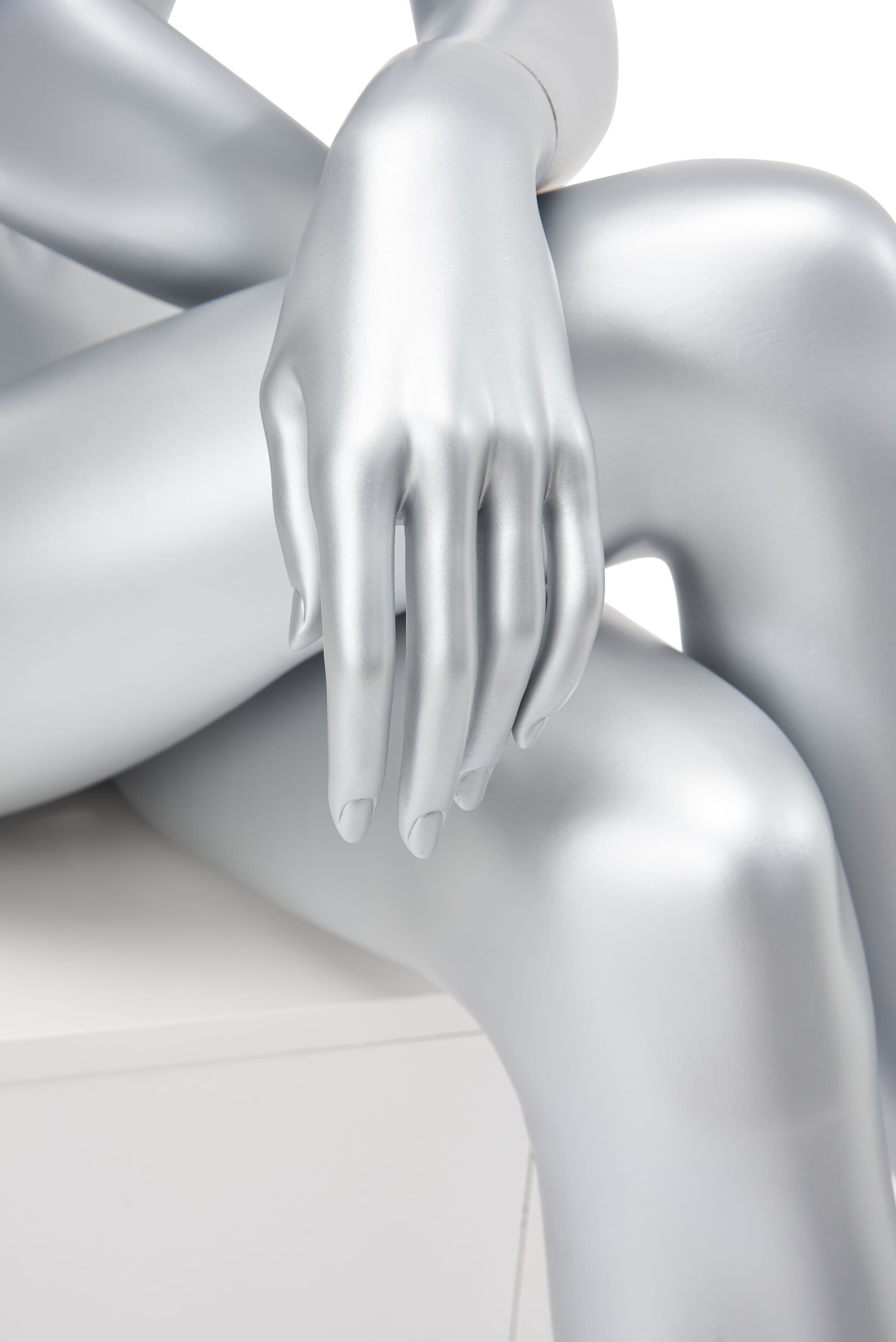 Abstract seated female mannequin measures 36 inch deep