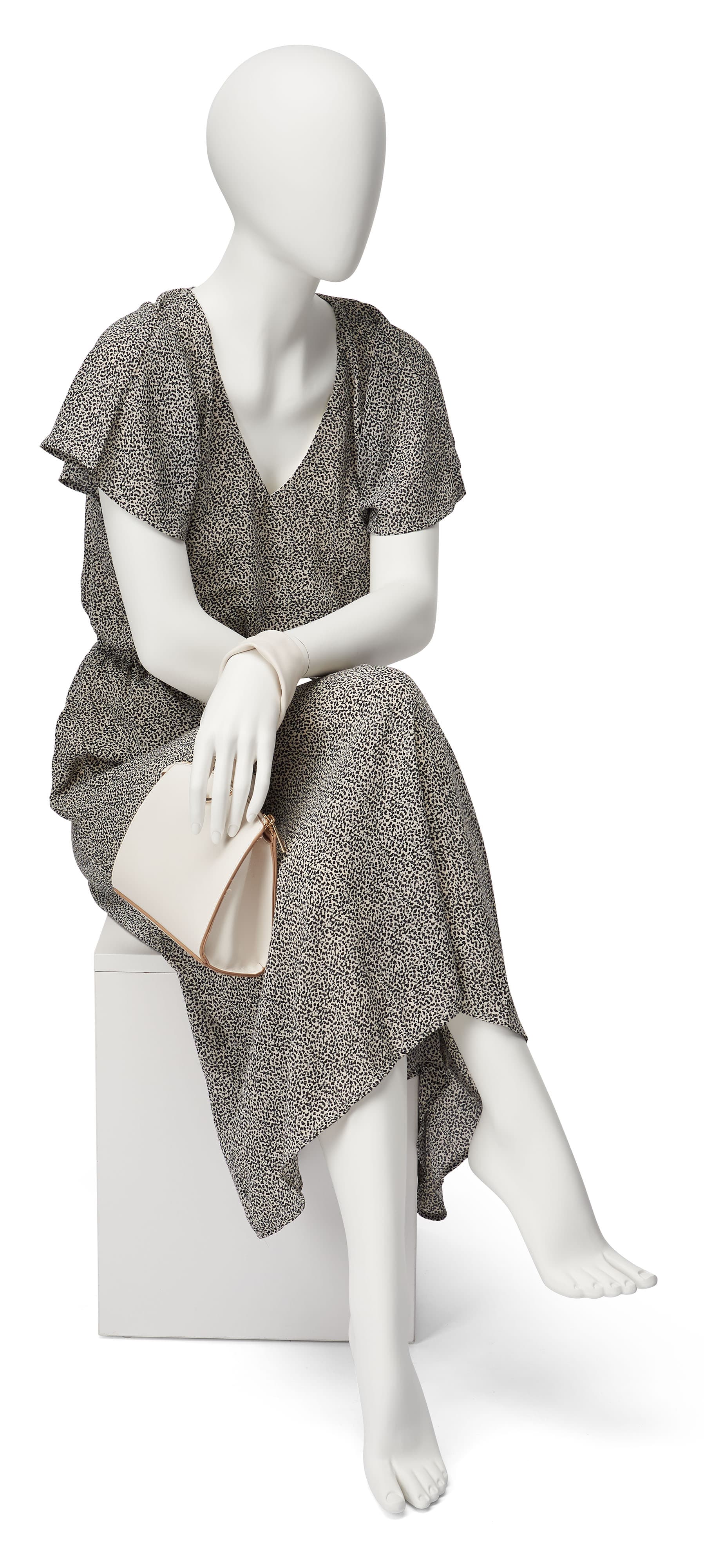 Abstract seated female mannequin with formed hands and feet 