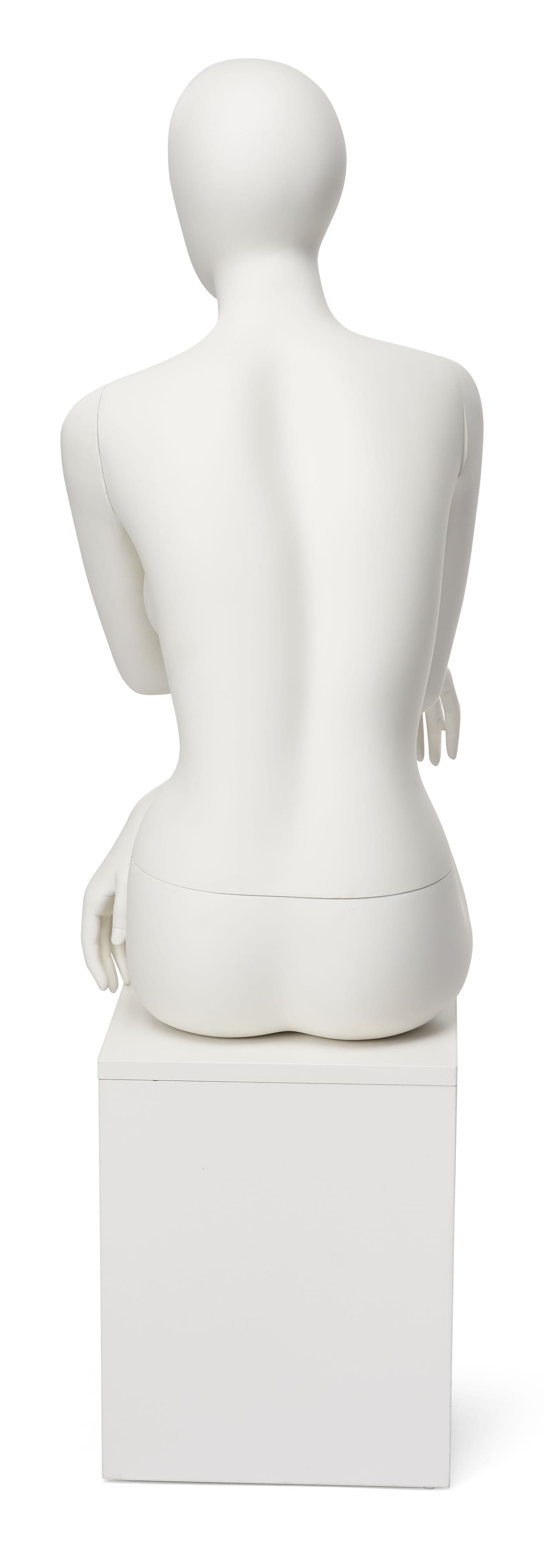 Abstract seated female mannequin measures 52 inches tall 