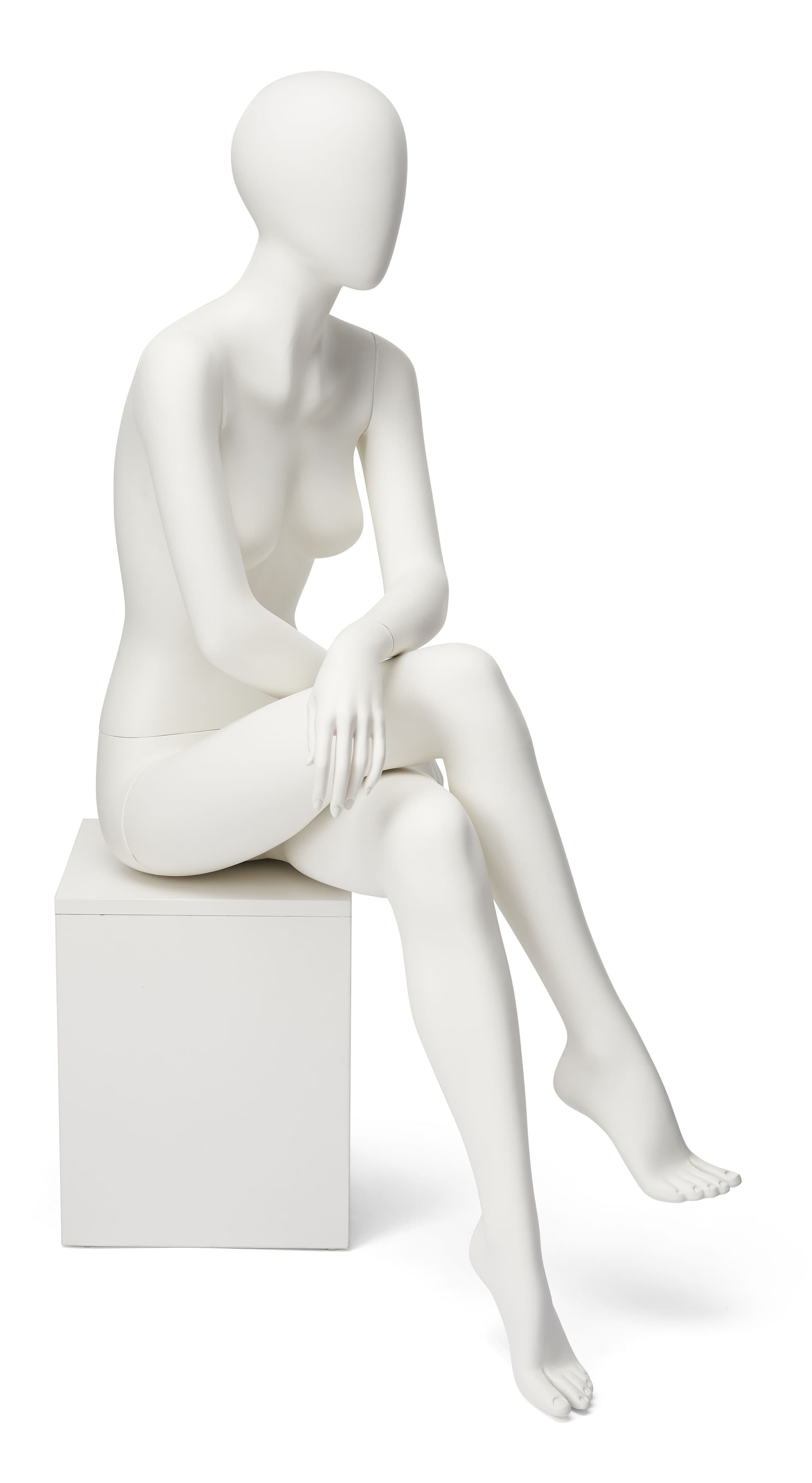 Abstract seated female mannequin with egg head design 
