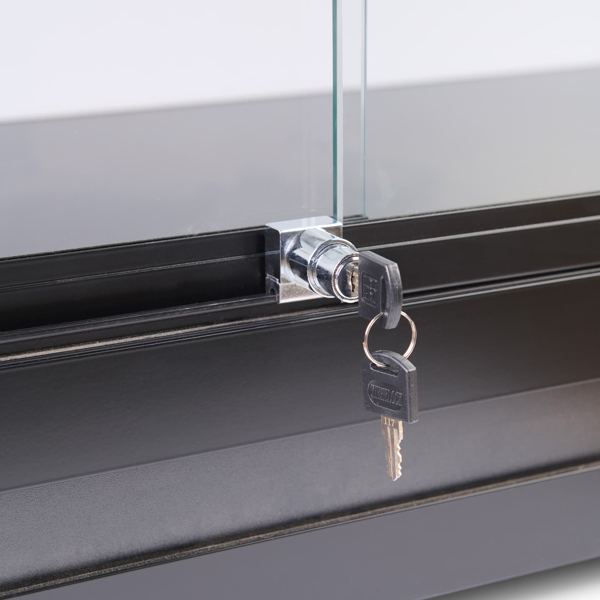 Slatwall display case with locking doors