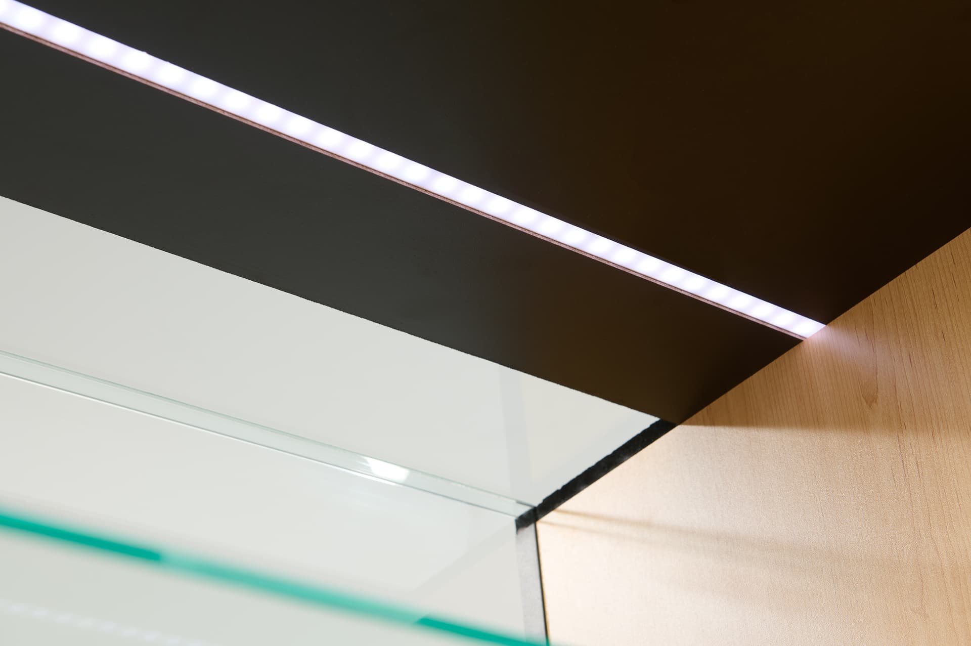 Two tone retail showcase with LED light panel 