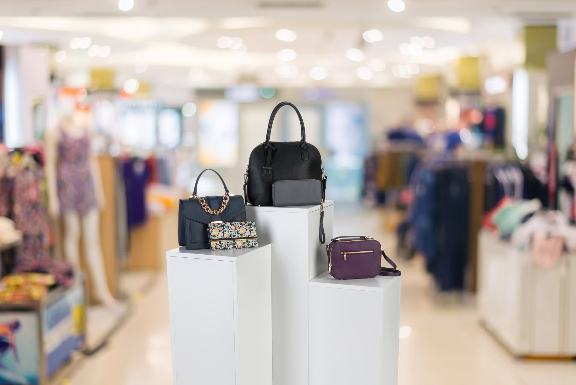 White Pedestal Stand in a Retail Store