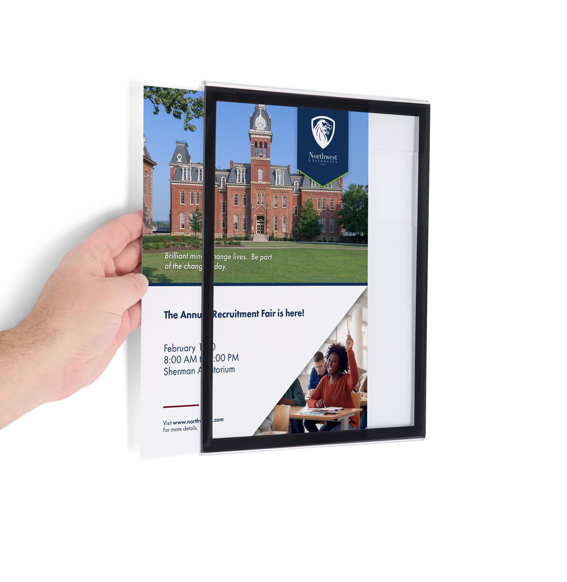 Graphic being inserted into the recycled acrylic frame