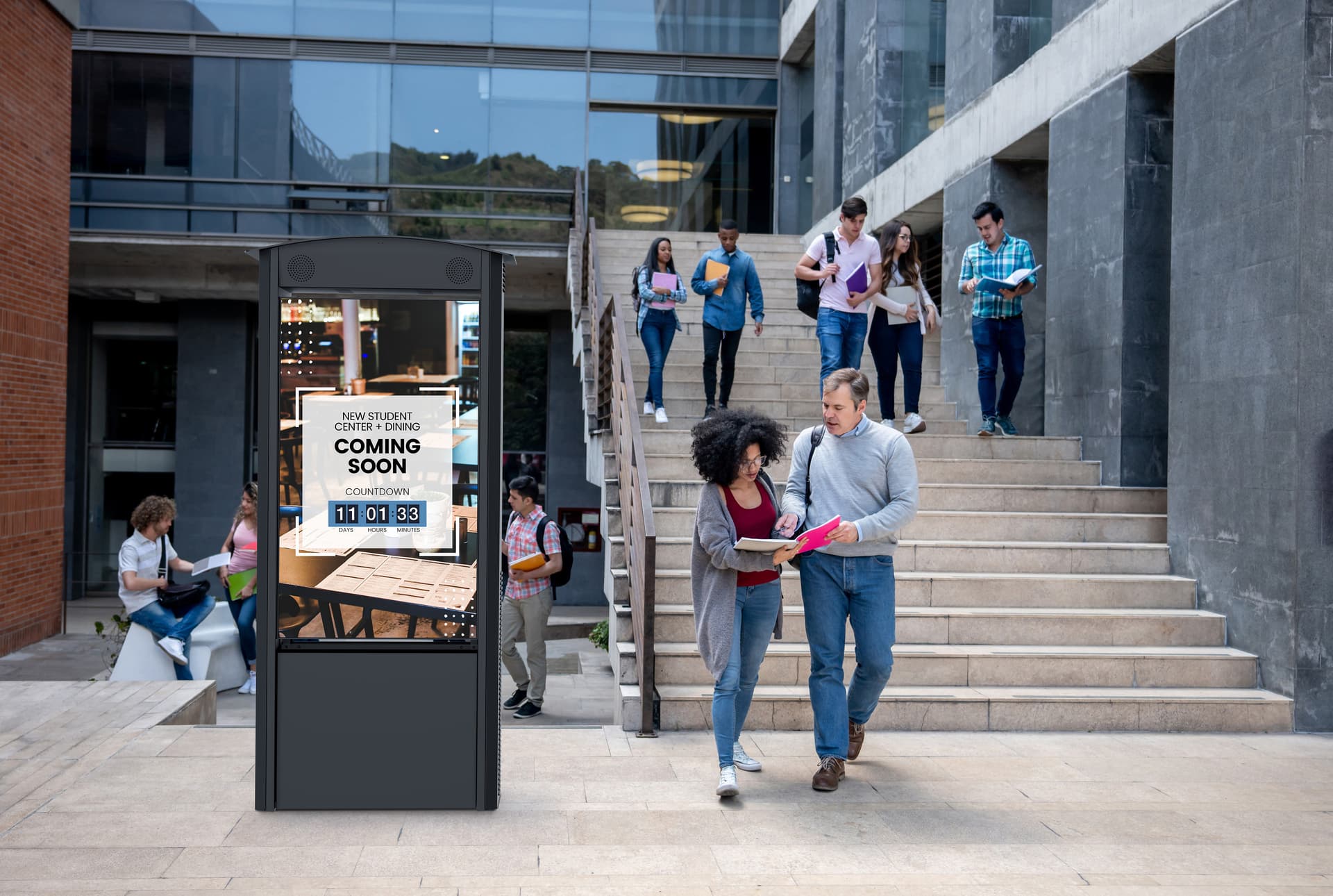 Outdoor digital Kiosk being used on a college campus