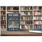 Acrylic sign holder on countertop with book signing advertisement