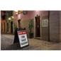 Sign boards for cafes, restaurants, concert venues, and parking lots