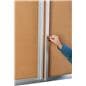 This enclosed 96 x 48 cork board includes a key set