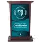Digital podium showcasing a graduation graphic on the front of the unit