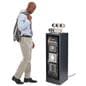 Pedestal display with digital sign with a passerby shopping the display