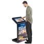 Floor standing touch screen kiosk with an individual interacting with the 39.3 inch tall interactive unit
