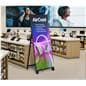 LED a-frame showcasing the digital poster in a tech store displaying an ad for wireless headphones