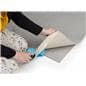 Removable carpet tape shown with flooring