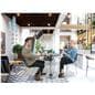 Cut-out tree design chair with abstract design