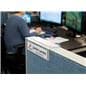 Adjustable acrylic cubicle name plate holder shown in office setting