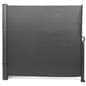 Retractable outdoor privacy divider is wall and floor mounted 