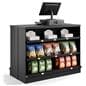 Retail cash wrap counter showcasing the front filled with impulse items like candy and chips