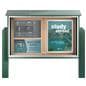 Outdoor bulletin board with posts showcasing higher education informational graphics