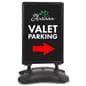 Free standing sign exhibiting a valet parking graphic 