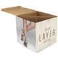 Branded cardboard display cube includes an internal x-shaped insert