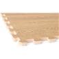 Foam wood floor tiles showing a close up of one of the 5/8 inch thick tile