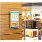 Digital signage ePaper being shown mounted on a wall showing a wayfinding graphic